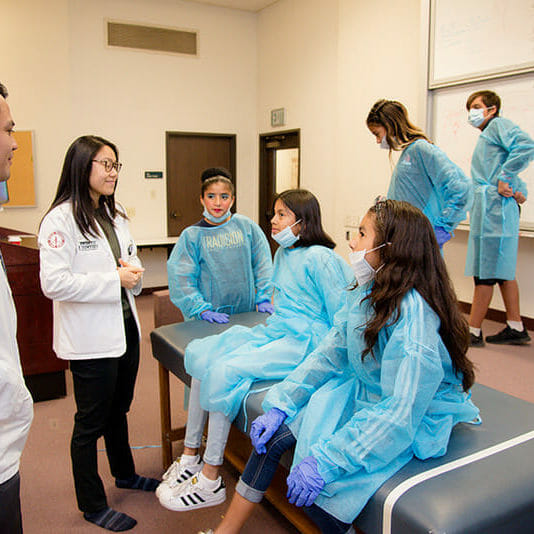 WesternU students lead Disease Etiology workshops to middle and high school students during Pomona Health Career Ladder and American Indian Health Career Ladder Saturday, Dec. 15, 2018. Workshops included how Norovirus tag, disease eitiology bingo, disease eitiology scavender hunt, excherichia coli aka E. coli, common infectious diseases and transmission mechanisms and StepLadder.